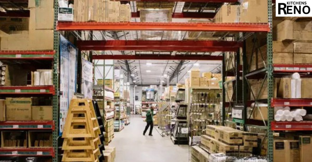Text: Shelves filled with affordable kitchen supplies in a Liverpool showroom, including bowls, utensils, storage containers, and kitchen accessories.